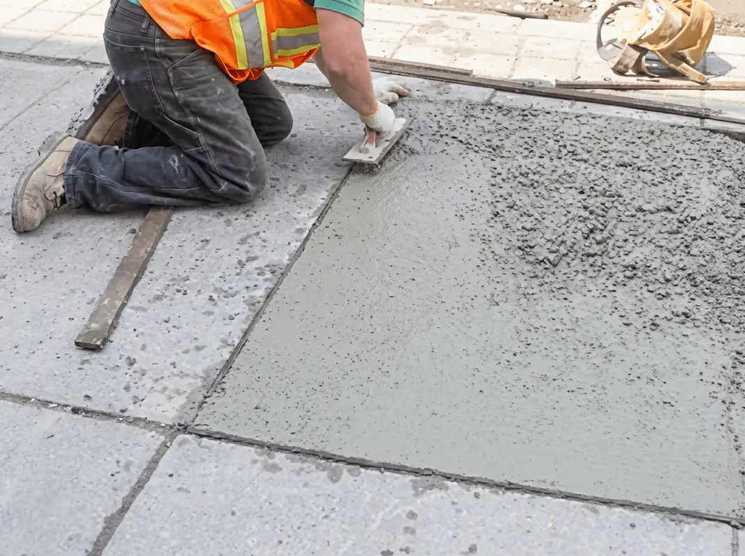 Professional repairing a concrete floor in Tulsa, OK