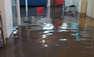 Basement with boiler, cabinets and washing machine completely flooded in Tulsa, OK