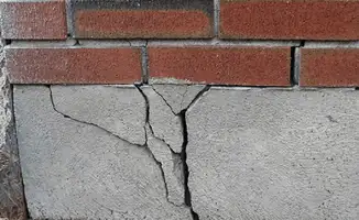 Concrete foundation with serious structural damage in Tulsa, OK